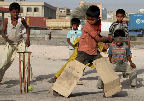 06_19_CvrStry-Cricket-Poor-kids-playing-cricket.jpg