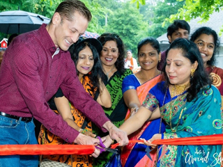 Women wearing vibrant saris walk for charity