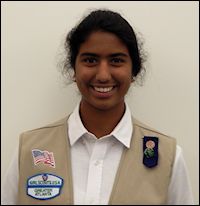 Maya Aravapalli, high school student, is getting desks and chairs for a school in India