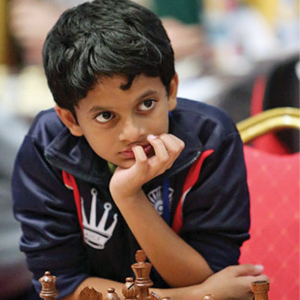 Good Sports: CHESS PRODIGY CHALLENGES WORLD CHAMP