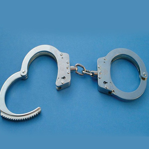 04_16_ChaiTime_Handcuffs.jpg