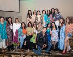 Community role models walk the ramp for Saris to Suits
