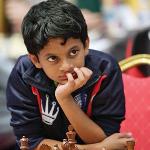 Good Sports: CHESS PRODIGY CHALLENGES WORLD CHAMP